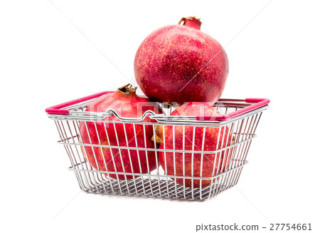 Pomegranates in the shopping basket isolated Pomegranates in the shopping basket isolated 27754661