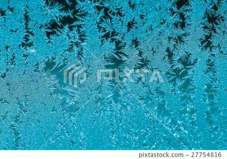 Ice patterns on glass. winter background Ice patterns on glass. winter background 27754816