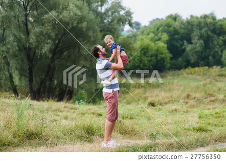 Father catching his son Father catching his son 27756350