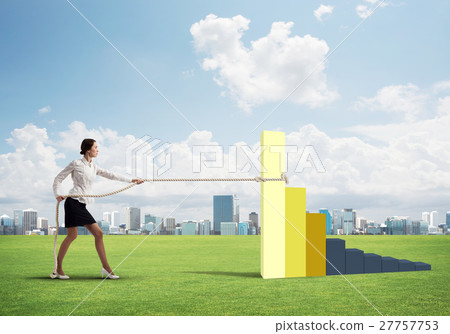 Businesswoman pulling arrow with rope and making it raise up Businesswoman pulling arrow with rope and making it raise up 27757753