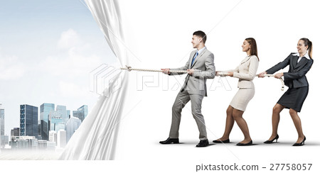 Young businesspeople working in collaboration and pulling white advertisement banner Young businesspeople working in collaboration and pulling white advertisement banner 27758057