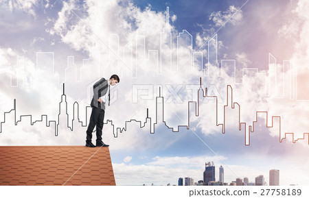 Businessman looking down from roof and modern cityscape at background. Mixed media Businessman looking down from roof and modern cityscape at background. Mixed media 27758189