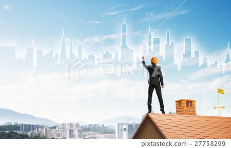 Man architect draw silhouette of modern city on blue sky. Mixed media Man architect draw silhouette of modern city on blue sky. Mixed media 27758299