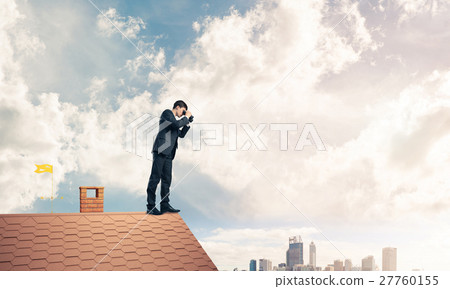 Mister boss on brick roof in search of something new. Mixed medi Mister boss on brick roof in search of something new. Mixed medi 27760155
