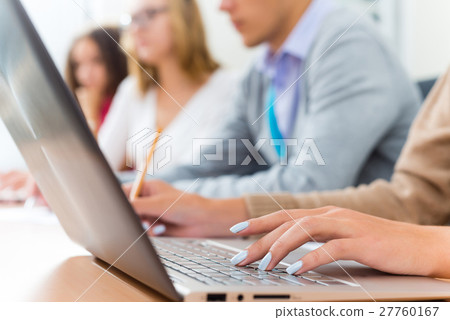 close-up of female hands on the laptop keyboard close-up of female hands on the laptop keyboard 27760167