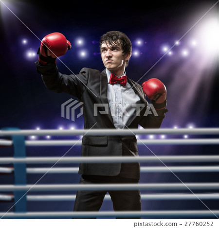 businessman with boxing gloves in the ring businessman with boxing gloves in the ring 27760252