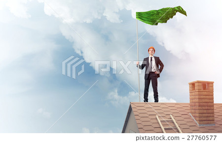 Young businessman with flag presenting concept of leadership. Mi 27760577