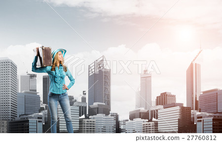 Attractive girl with old suitcase Attractive girl with old suitcase 27760812