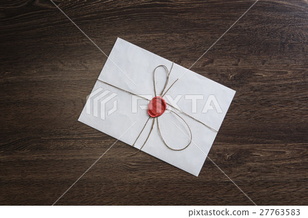 Letter with seal on table Letter with seal on table 27763583