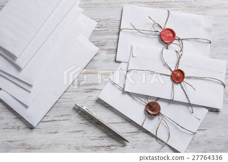 Letters with seal on table Letters with seal on table 27764336