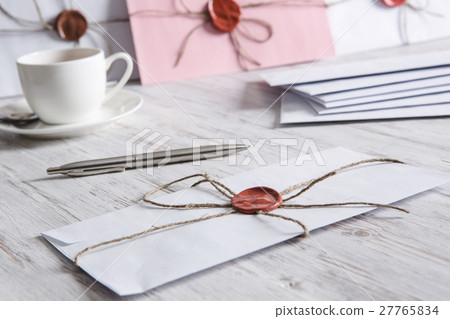 Letter with seal on table Letter with seal on table 27765834