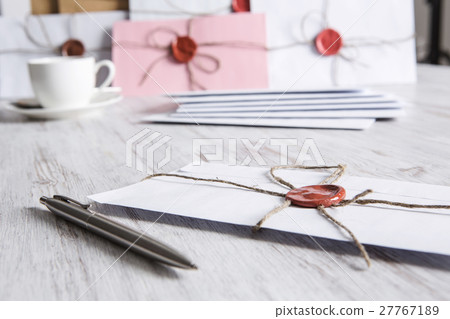 Letter with seal on table Letter with seal on table 27767189