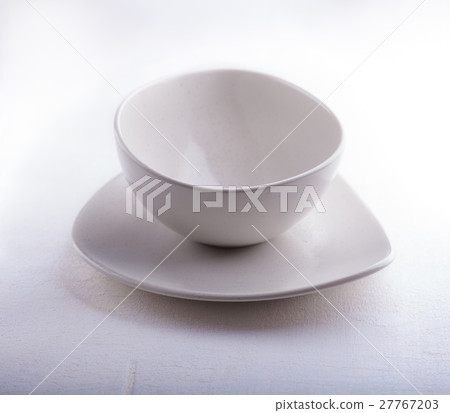 Two Empty bowls placed on a white surface 27767203