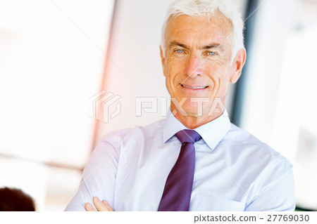 Businessman at the office Businessman at the office 27769030