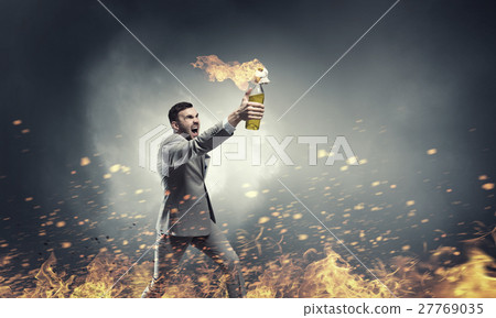 Businessman throwing petrol bomb Businessman throwing petrol bomb 27769035