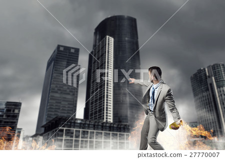 Businessman throwing petrol bomb 27770007