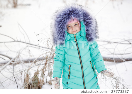 Little girl smiles in winter. Little girl smiles in winter. 27773287