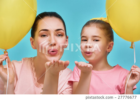 Mother and her daughter are having fun 27776677
