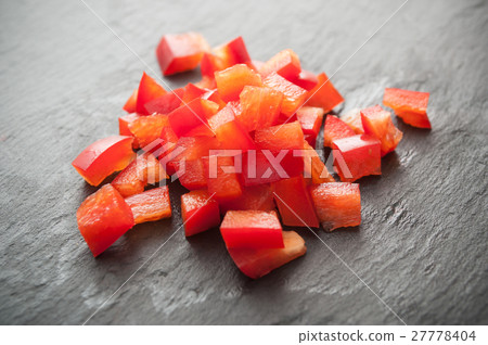 red peppers cubes on chalkboard background red peppers cubes on chalkboard background 27778404
