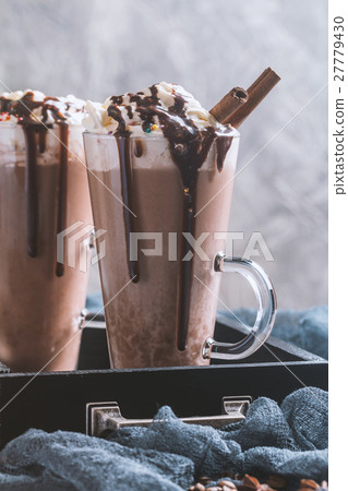 Ice chocolate in tall glass mugs  27779430