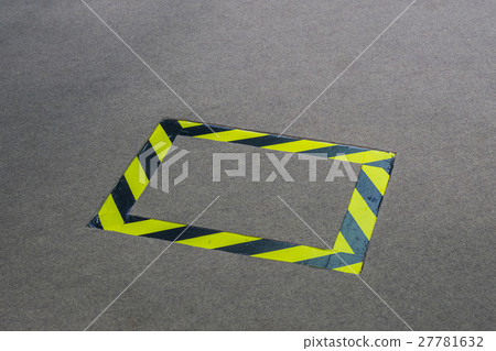 black and yellow tape placed on the carpet 27781632