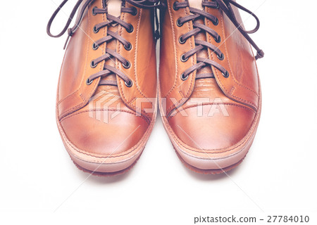 man leather brown shoes on white background. man leather brown shoes on white background. 27784010