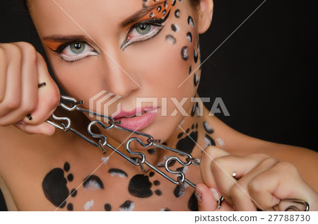 young woman with an animal face art and spines 27788730