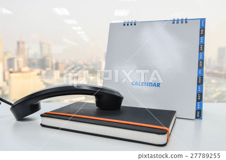 IP Phone handset on the notebook and calendar IP Phone handset on the notebook and calendar 27789255