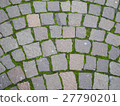 Square brick stone pattern on the street with moss 27790201