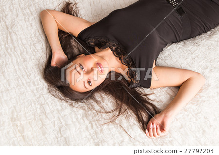 Stylish woman in gorgeous fashion black dress with 27792203