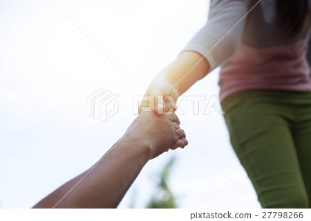 Concept Young girl Hands reaching out to help Concept Young girl Hands reaching out to help 27798266