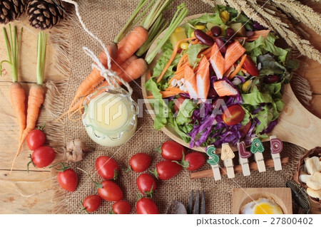 Fresh salad and egg with dressing delicious. Fresh salad and egg with dressing delicious. 27800402