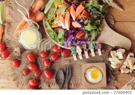 Fresh salad and egg with dressing delicious. Fresh salad and egg with dressing delicious. 27800403