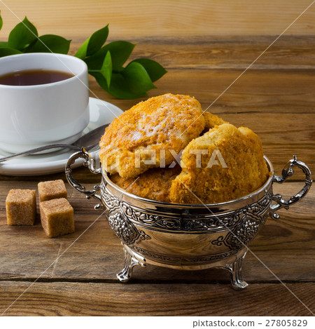Homemade biscuits and cup of tea, square Homemade biscuits and cup of tea, square 27805829