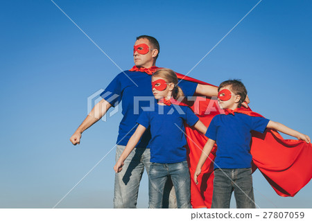 Father and children playing superhero at the day time. 27807059