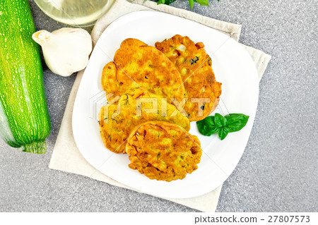 Flapjack chickpeas in plate on granite table top 27807573