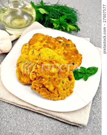 Flapjack chickpeas with zucchini on stone table Flapjack chickpeas with zucchini on stone table 27807577