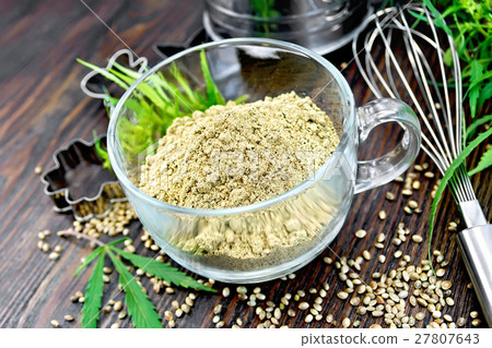 Flour hemp in glass cup on board 27807643