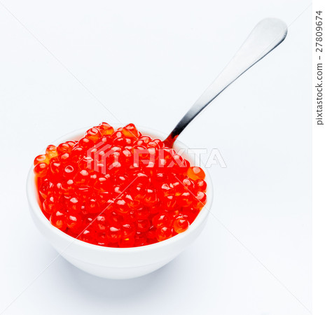 Red caviar on a white background Red caviar on a white background 27809674