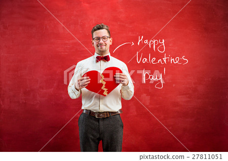 Young funny man with abstract broken heart 27811051