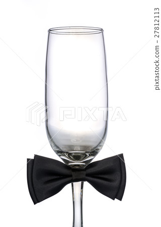 empty champagne glass with bow tie empty champagne glass with bow tie 27812113