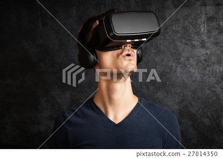 Man using VR goggles Man using VR goggles 27814350