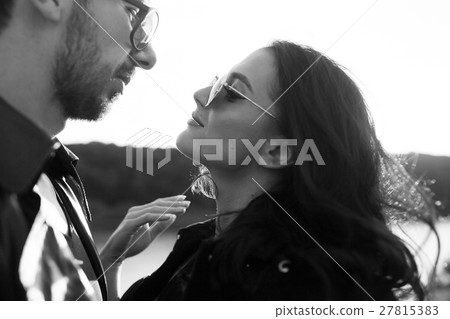 beautiful young couple looking at each other beautiful young couple looking at each other 27815383