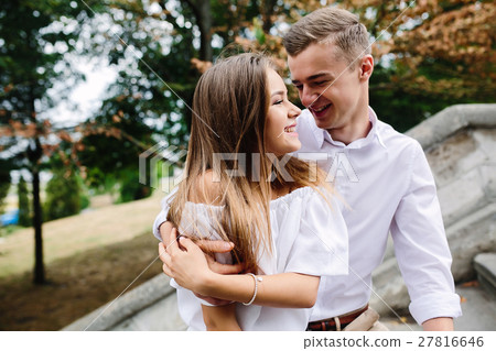 couple posing in the park couple posing in the park 27816646