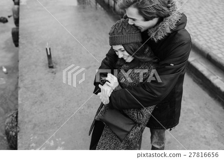 beautiful couple having fun on the pier 27816656