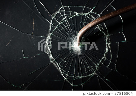 Broken glass texture. rusty crowbar Broken glass texture. rusty crowbar 27816804
