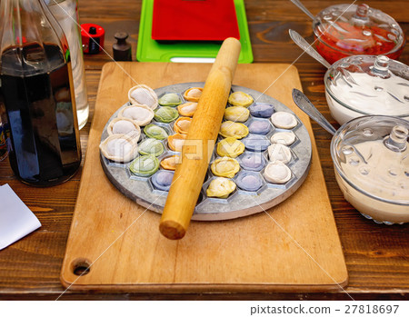 Meat dumplings russian pelmeni on wooden Meat dumplings russian pelmeni on wooden 27818697