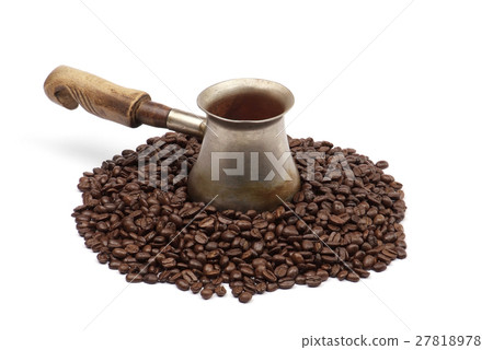 old copper coffee pot with coffee beans 27818978