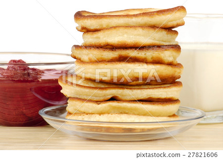 heap of pancakes with bowl of strawberry jam heap of pancakes with bowl of strawberry jam 27821606