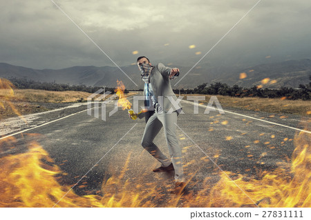 Businessman throwing petrol bomb 27831111